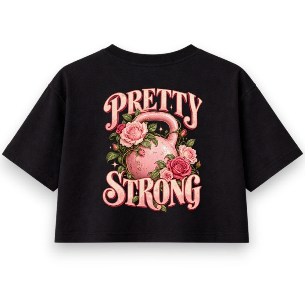 Pretty Strong Oversize Crop Top Schwarz mit rosa Kettlebell und Rosen Backprint